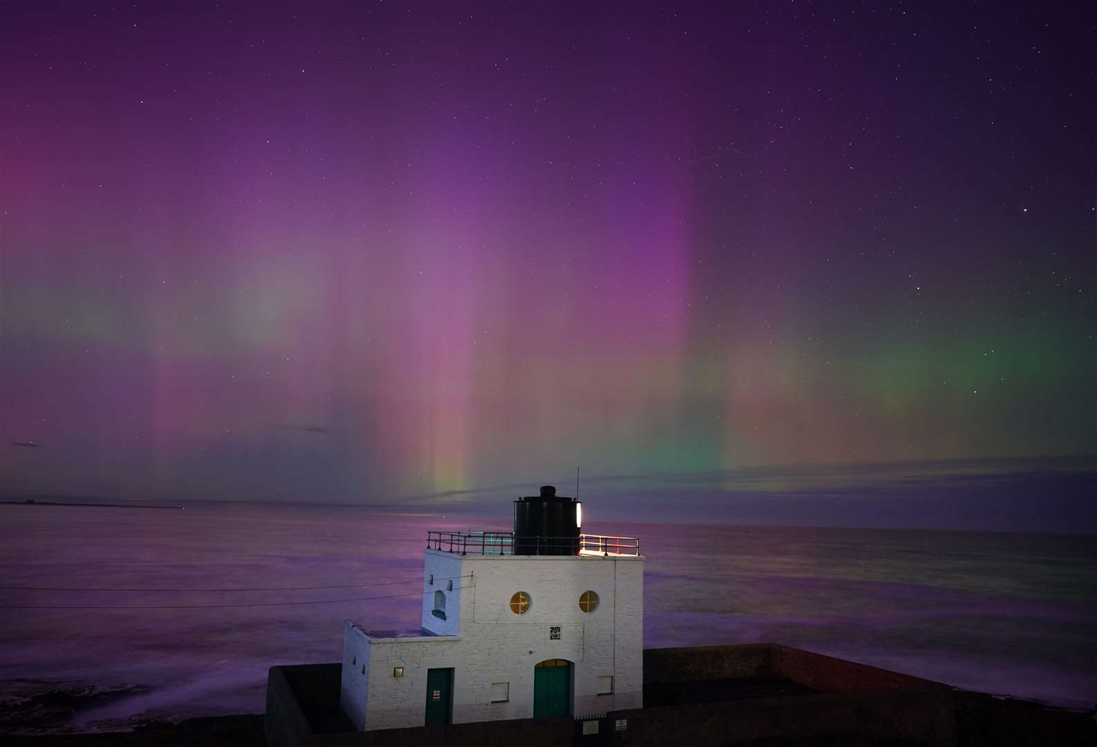 The aurora borealis was seen across the UK (Owen Humphreys/PA)