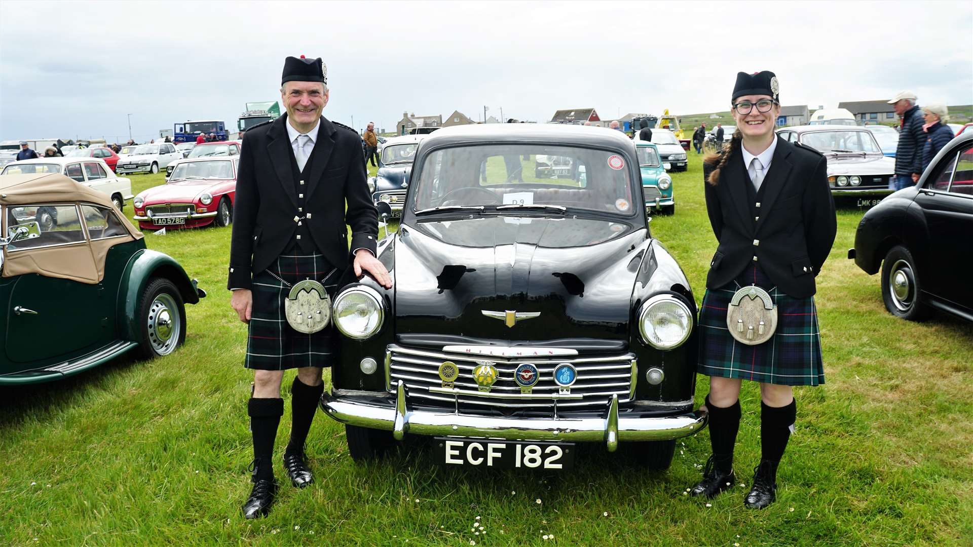 Gordon Tait and his daughter Shona who both played in the pipe band at the event. Shona recently graduated with distinction in engineering and Gordon was showing his off his 1952 Hillman Minx Mark V. Picture: DGS