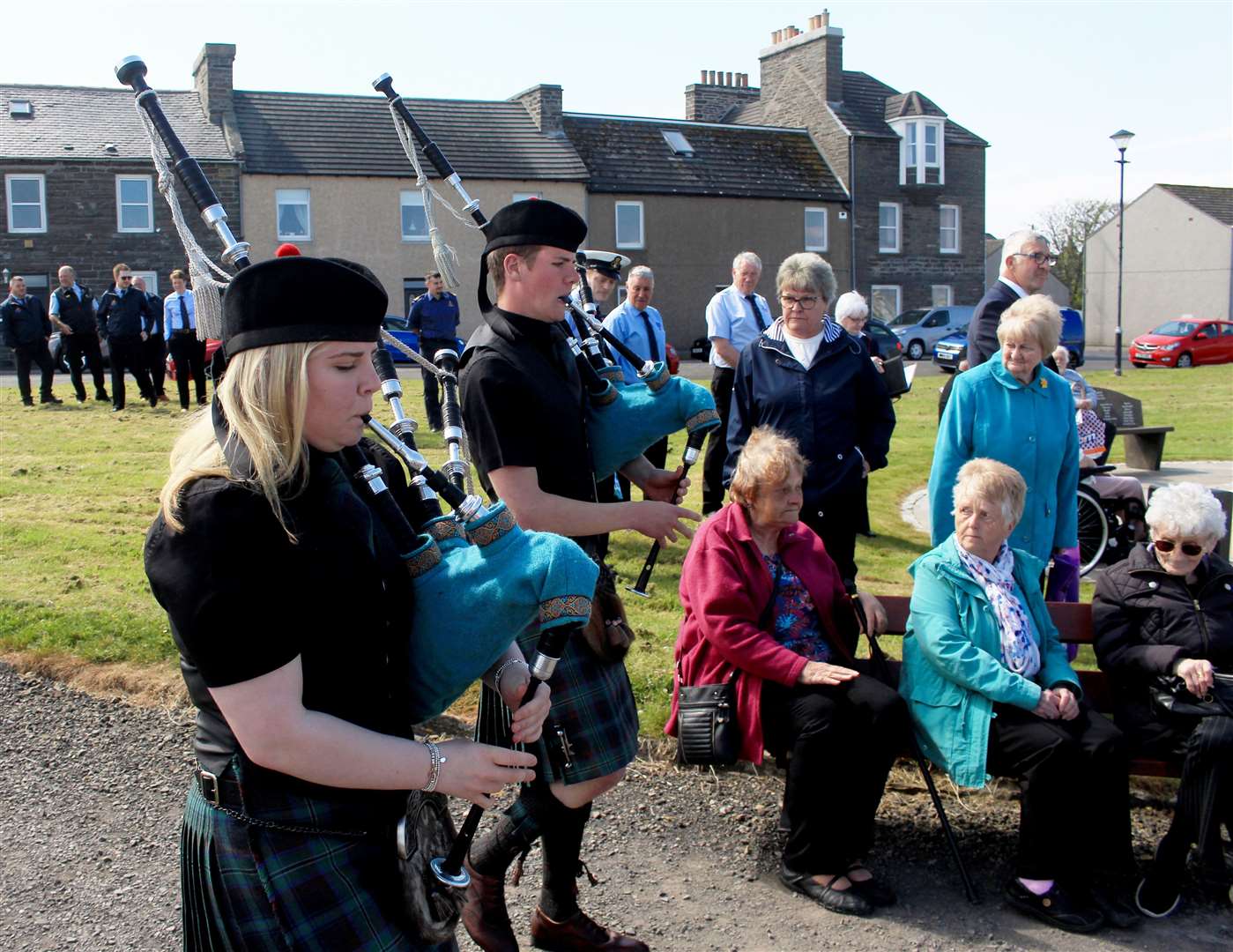Pipers Morven and Glenn Miller making their way to the memorial. Picture: Alan Hendry