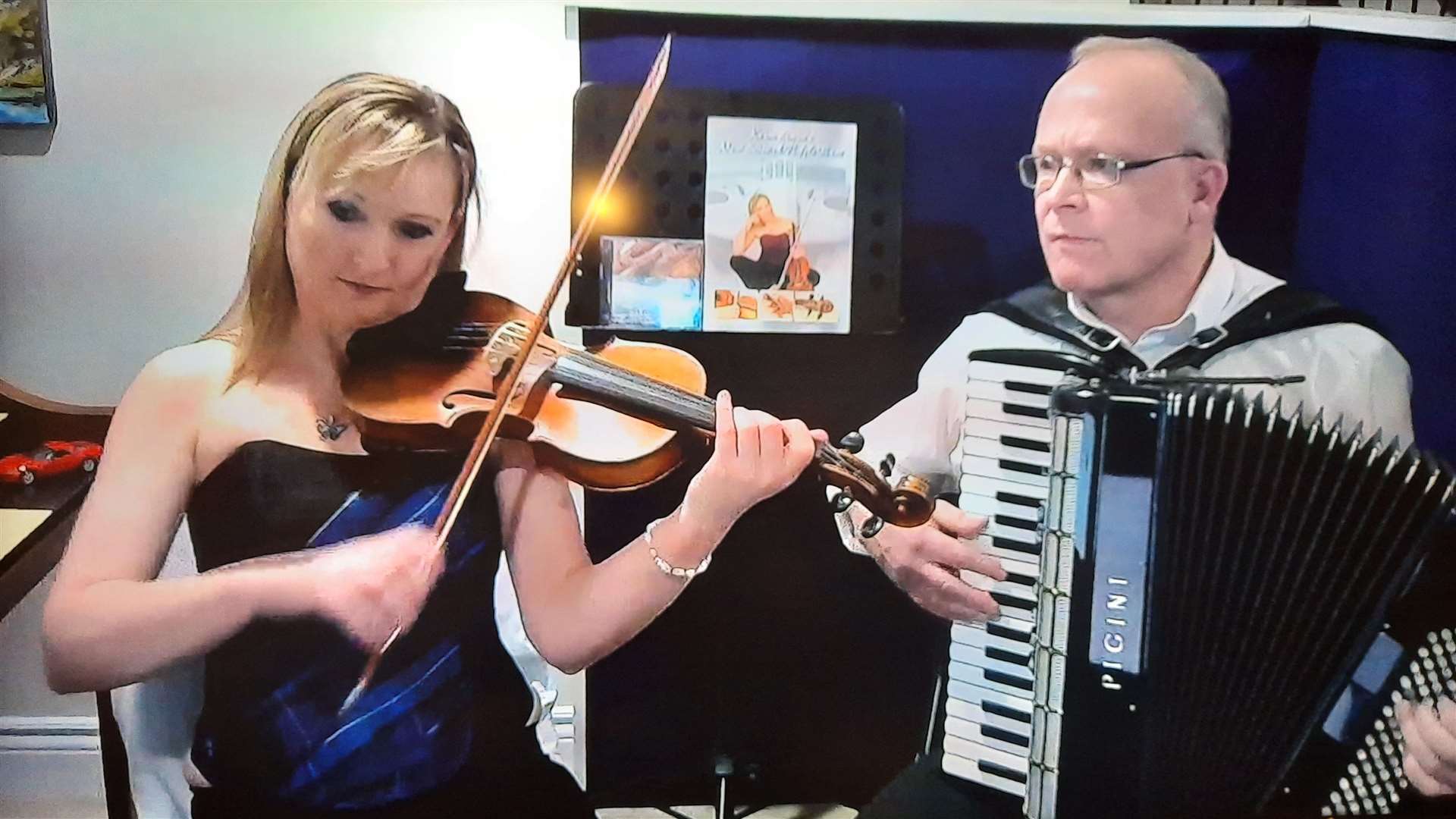 Karen Steven and Alastair MacDonald performing in an online show from Canada.