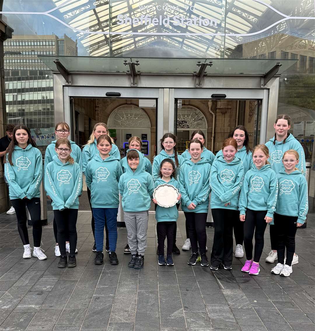 Quiz team members from Ashleigh Campbell’s Castle View Stables outside Sheffield station.