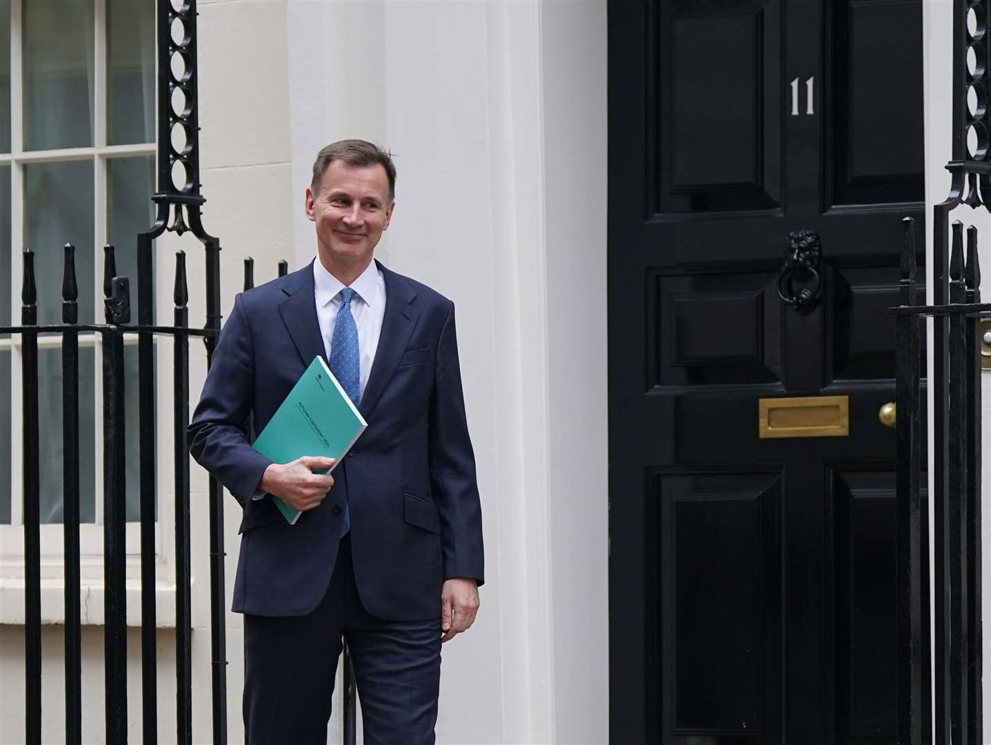 Chancellor Jeremy Hunt announced plans to give householders living beside new power lines money off their electricity bills for 10 years as part of his autumn statement (Yui Mok/PA)