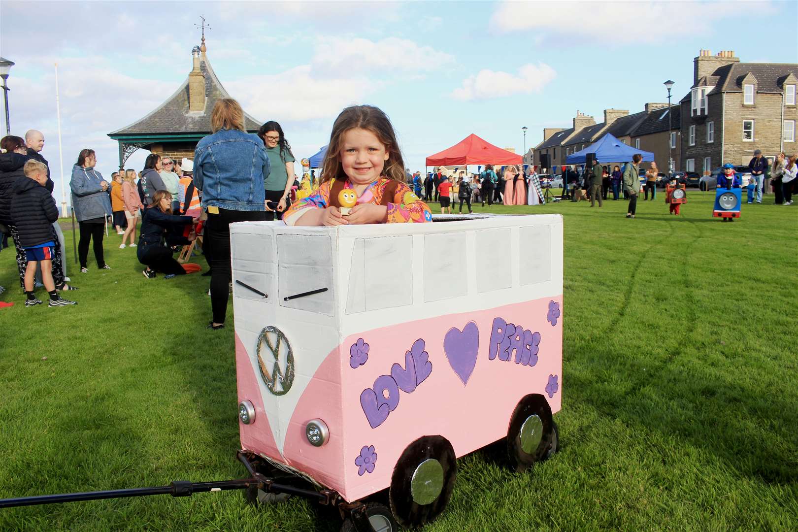 Olivia Florence (4) was spreading a message of peace and love in a VW van. Picture: Alan Hendry