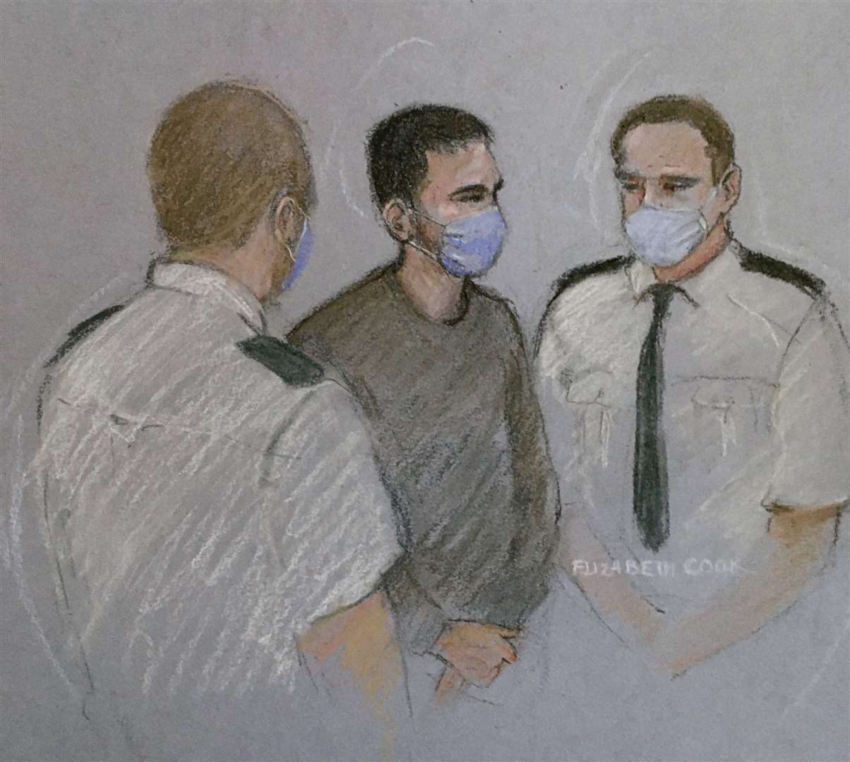Cody Ackland, centre, during a previous appearance at Plymouth Magistrates’ Court (Elizabeth Cook/PA)