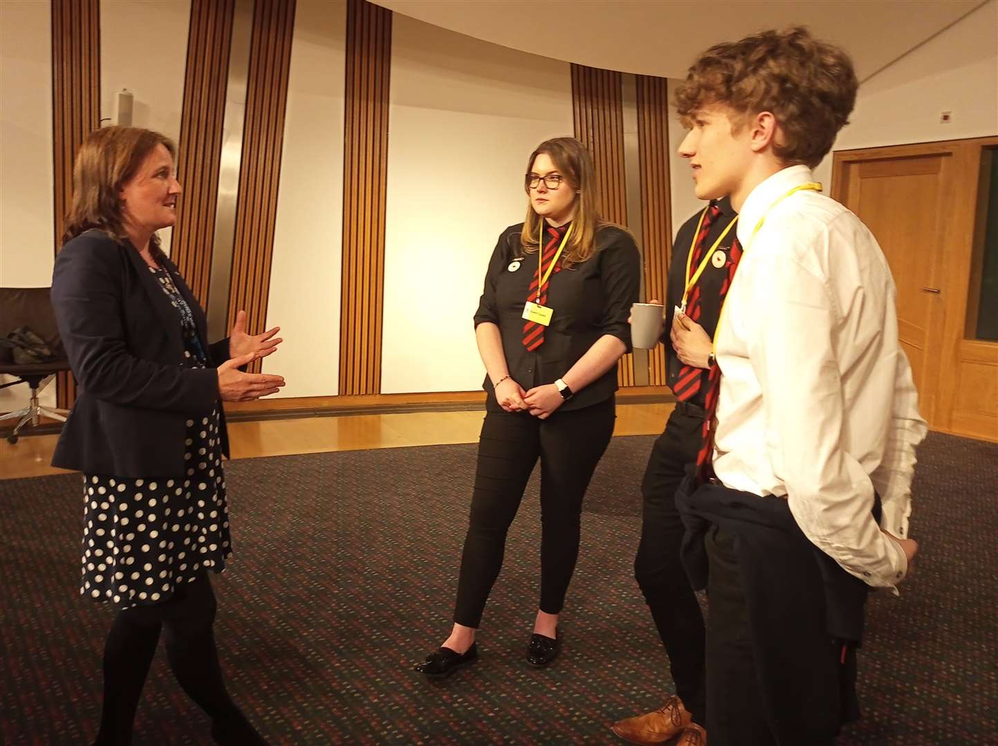 Ashleigh Coghill and Innes Morgan (with Kyle Leavesley partly hidden) meeting local MSP Maree Todd.
