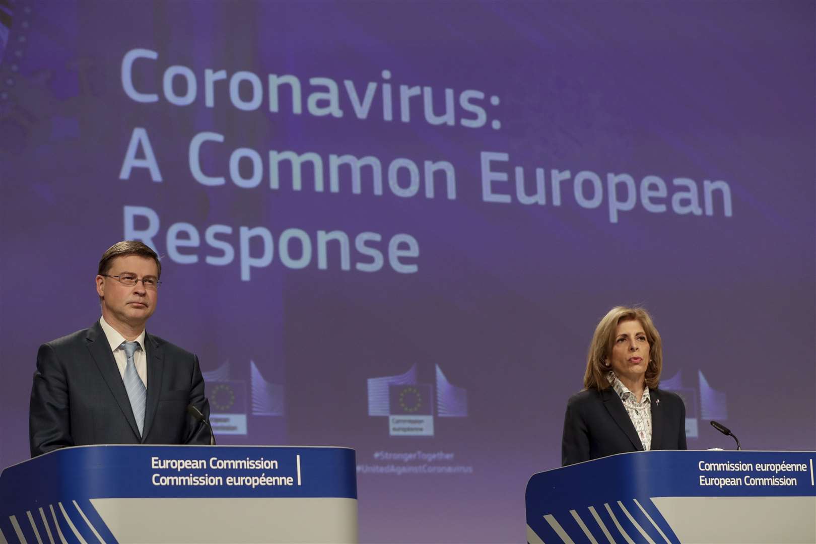 European Commission executive vice-president Valdis Dombrovskis alongside health commissioner Stella Kyriakides (Stephanie Lecocq/AP)