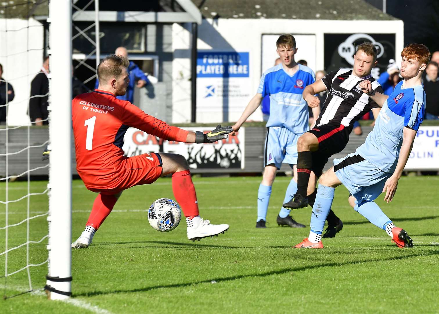 Wick Academy's Jack Halliday fires the ball past Turriff keeper Fraser Hobday during the Scorries' 2-0 win at Harmsworth Park. Picture: Mel Roger