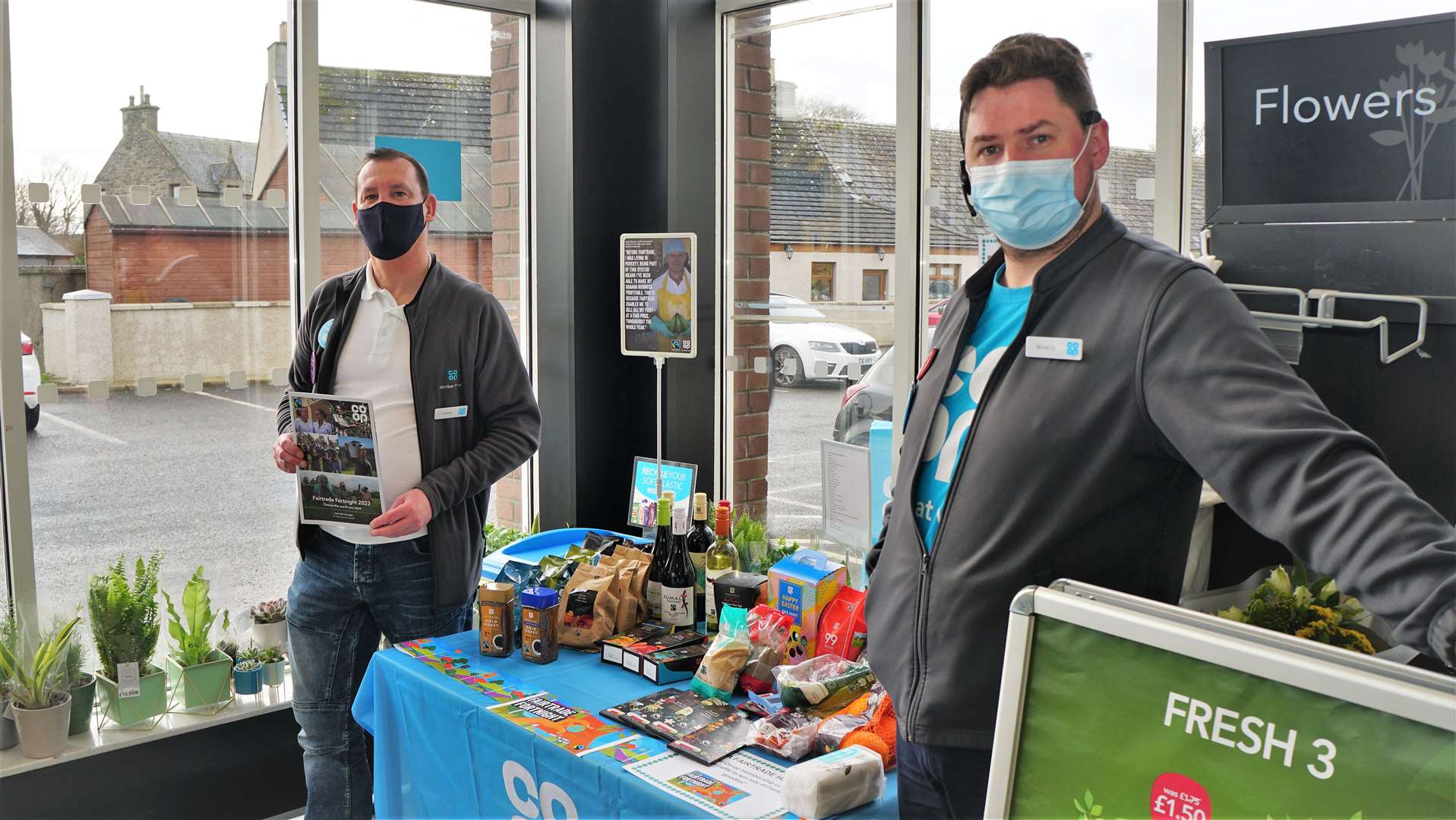 Co-op member pioneer Jamie Robson, left, and store manager Modris Karklins at the opening of the Fairtrade Fortnight in Wick Co-op. Picture: DGS