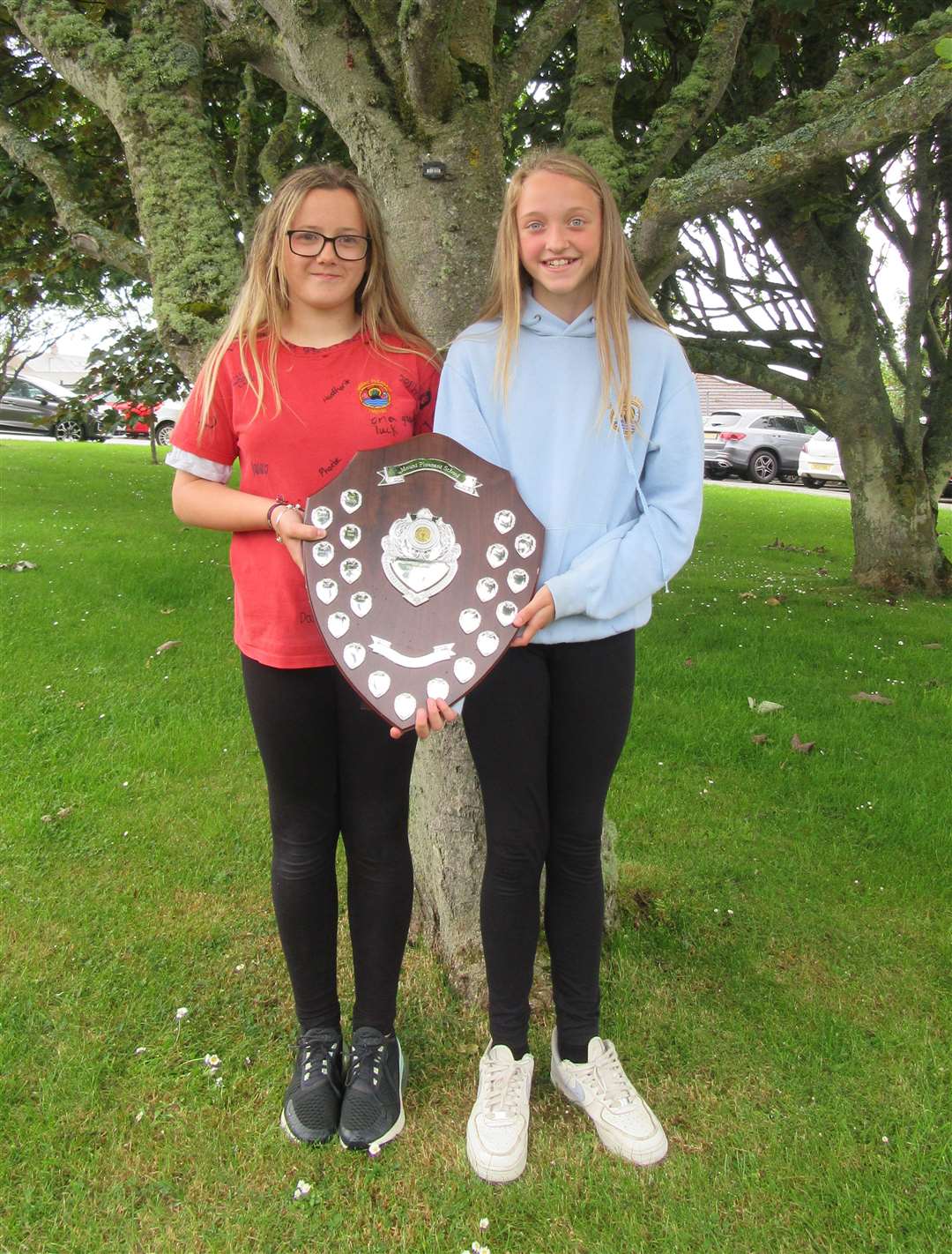 Thor house captains Maddison Morrison and Brooke Cowie with the winners’ shield for their team.