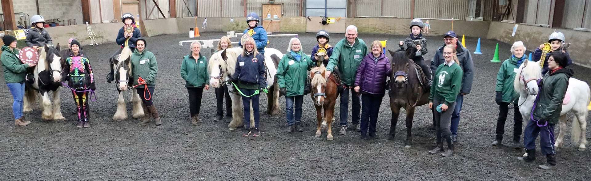 Brian and Janis Scollay presented the trophies and rosettes to children in ride three. Picture: Neil Buchan