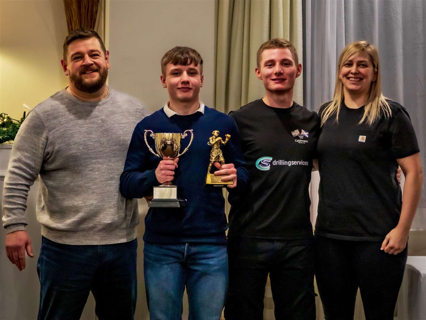 Overall clubman of the year Koby Stewart with coaches Richard Thurling, Cailean Fraser and Lisa Robertson at the presentation evening in the Norseman Hotel.