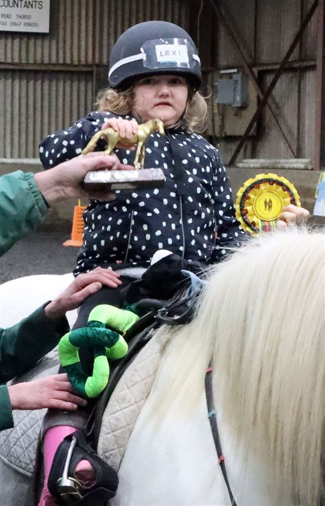 Lexi MacGregor receiving her prize. Picture: Neil Buchan