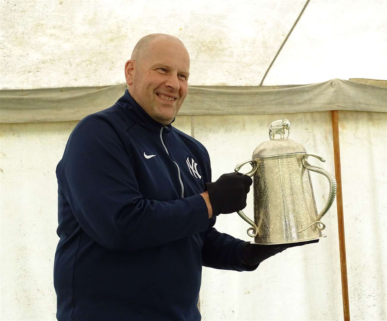 Caithness junior coach Donald Buchanan gets his hands on the Calcutta Cup at Millbank on Saturday. Picture: Anja Johnston