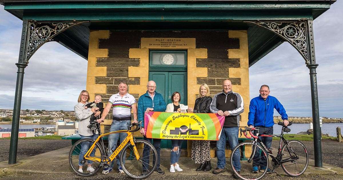 Donald’s daughters Lynne and Lauren and grandson Harry with Arthur Bruce, Willie MacDonald and members of the Dounreay Employees Charity Fund. From left: Lynne Davidson with Harry, Arthur Bruce, Alistair Mackay (committee member), Lauren McWilliam, Marie Mackay (secretary), Alan Farquhar (chairman) and Willie MacDonald.
