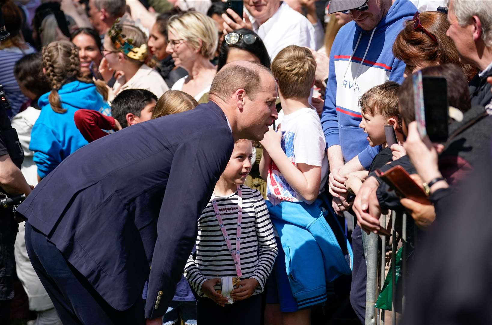 William chats to a little boy in the crowds (Andrew Matthews/PA)