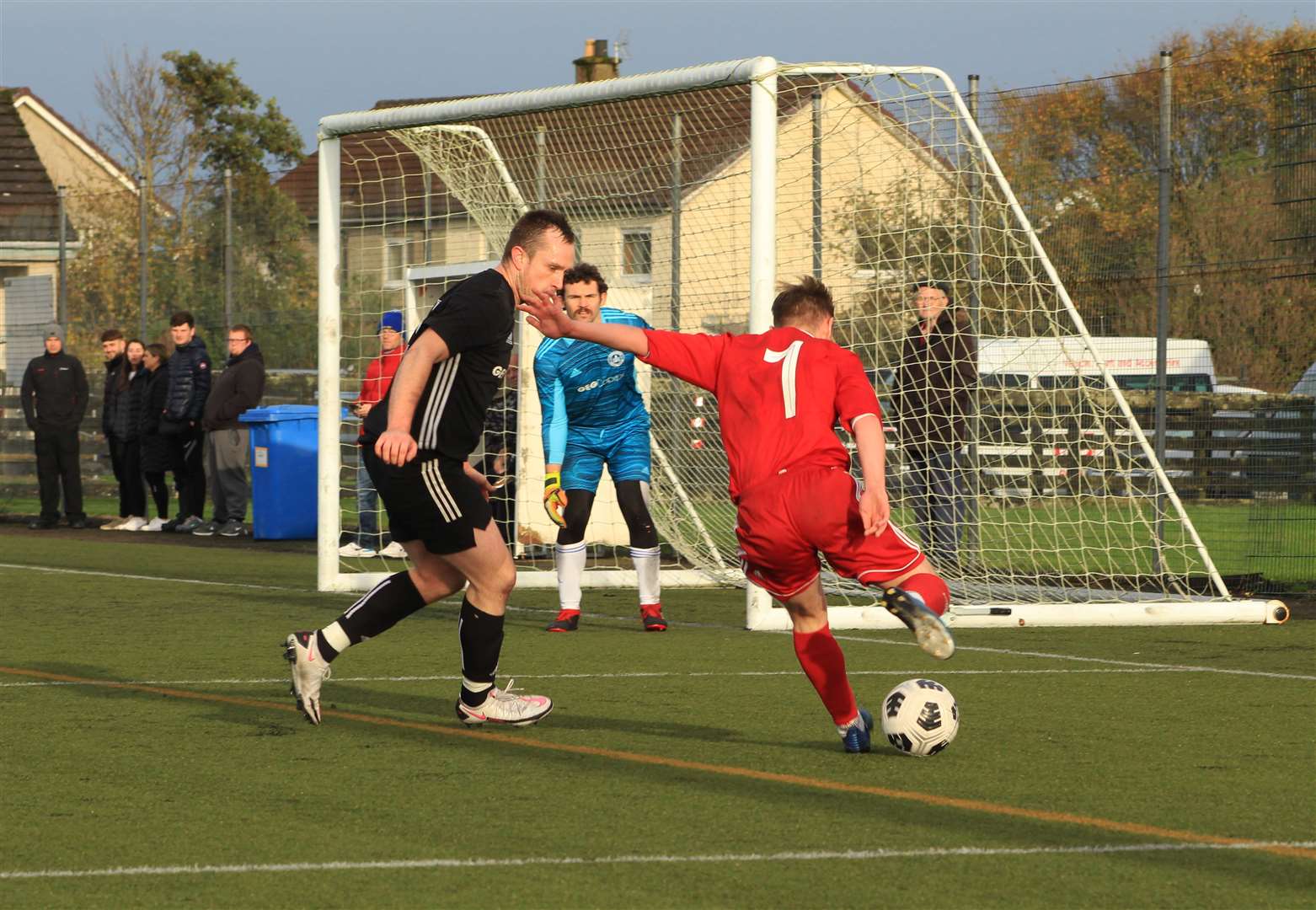 Cameron Montgomery of Thurso is trying to find a way past the Invergordon defense in the clubs' final game in October.  Invergordon won 2-1 that day after scoring two late goals.  Photo: Alan Hendry