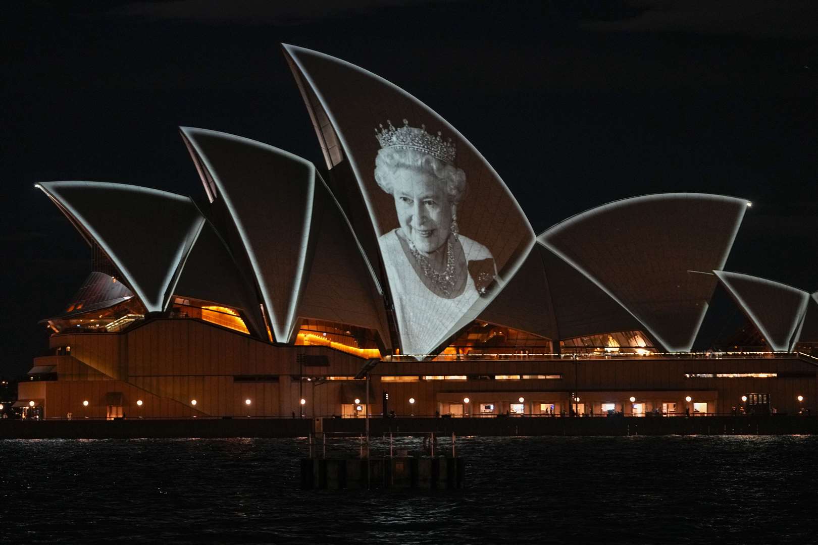 The Sydney Opera House was illuminated with a portrait of Queen Elizabeth II in Sydney (Mark Baker/AP)