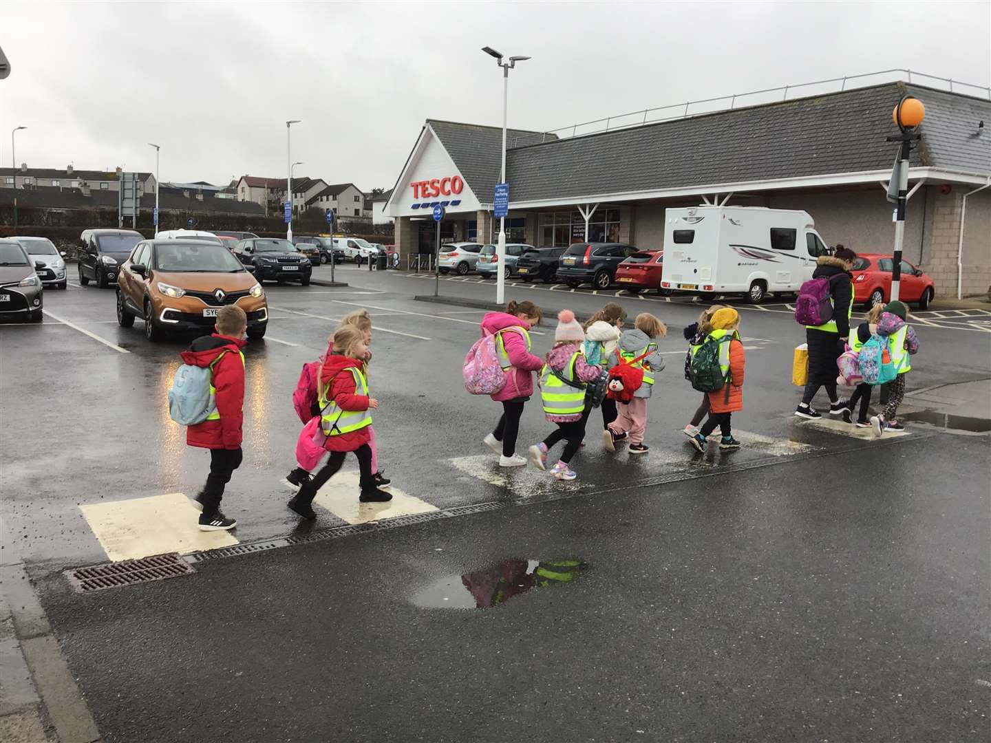 Children on their way to Tesco.