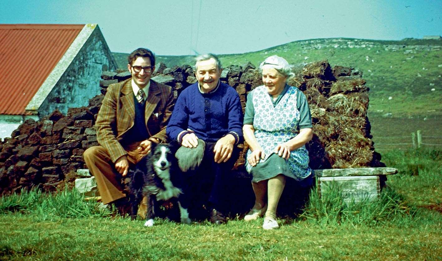 James and Mary-Ann Calder liked to sit at their peat stack, and are joined here by Dr Jim Calder, their grandson, who supplied the pictures, and Misty the collie.