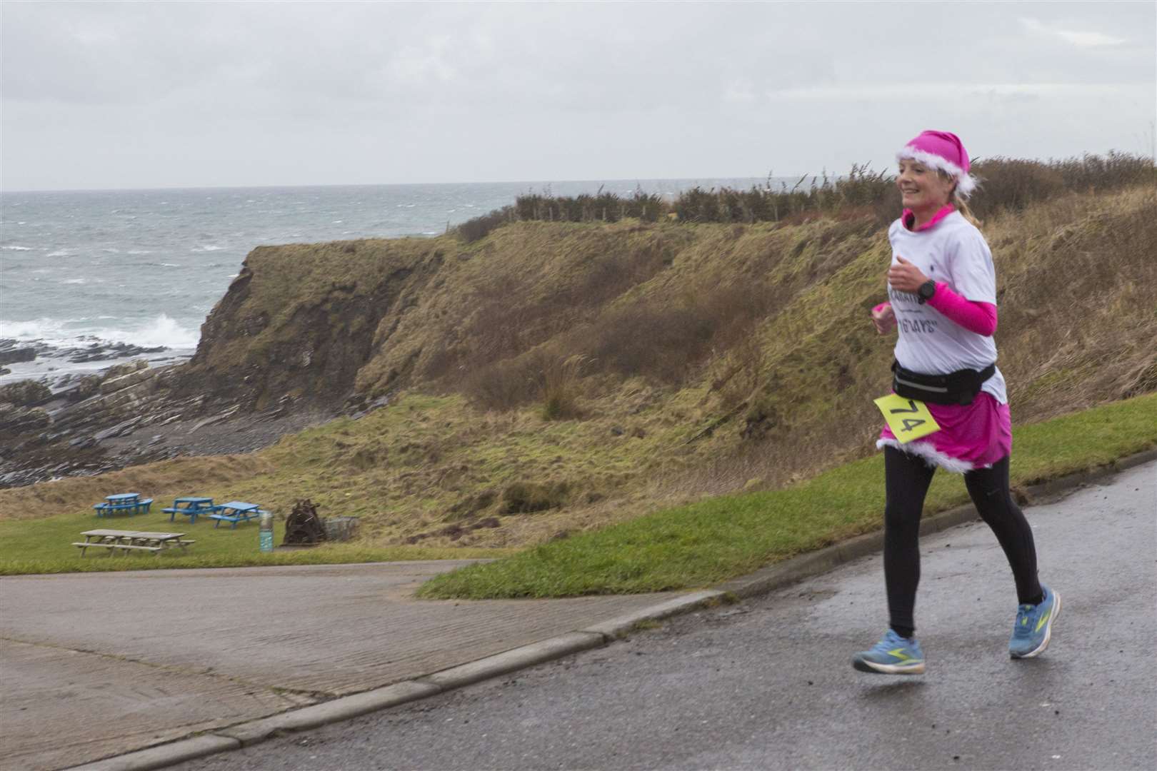 Lorna Stanger began her final marathon of 16 by taking part in the 5k Santa Run at Staxigioe on Sunday before running home to Thurso. Picture: Robert MacDonald/Northern Studios