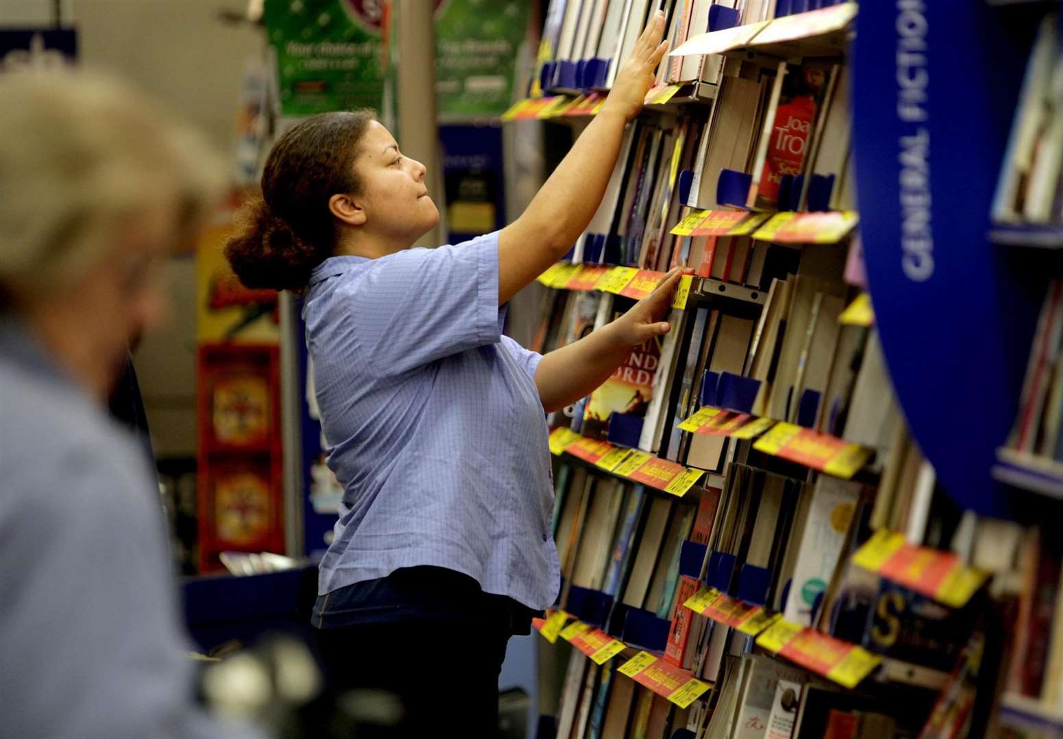 A general view of an employee at a WH Smith store in Bristol (Anthony Devlin/PA)