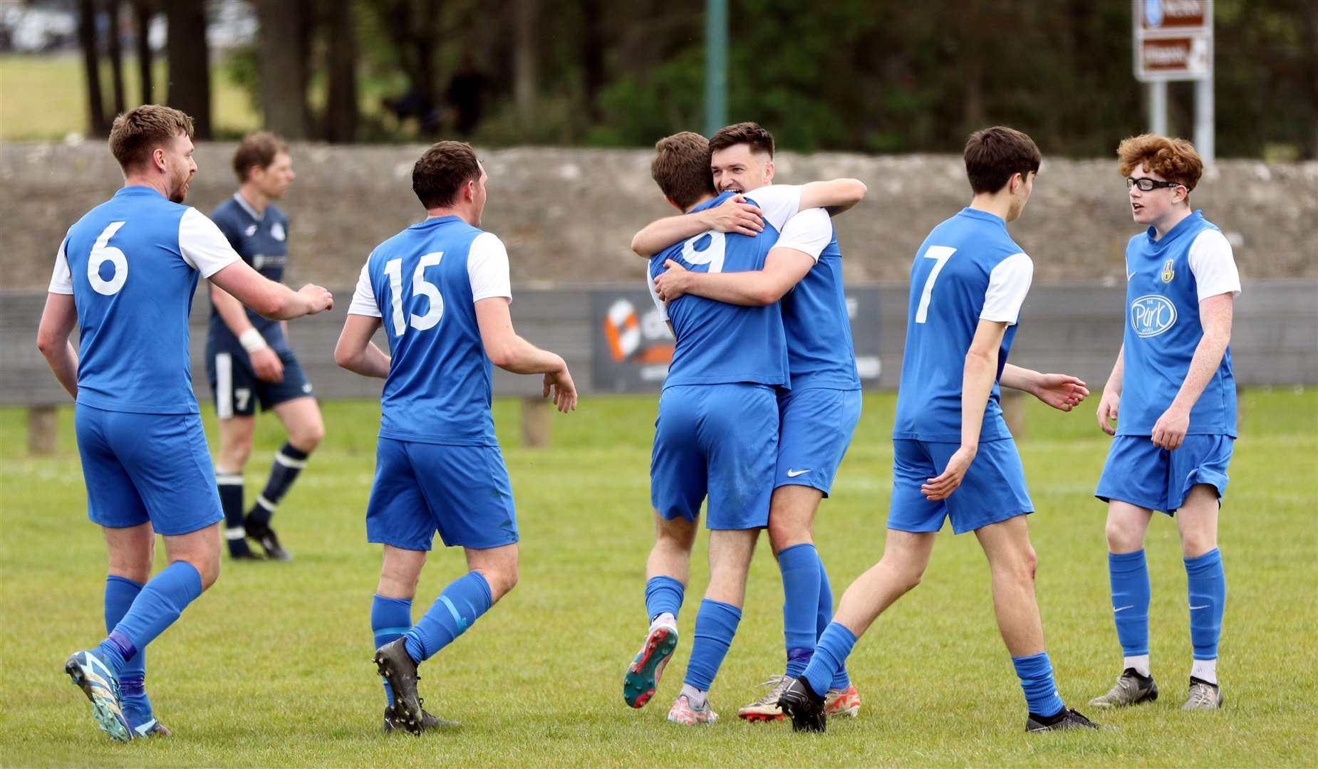 No 9 John Hooker is congratulated after completing the scoring in Acks' 4-2 victory. Picture: James Gunn