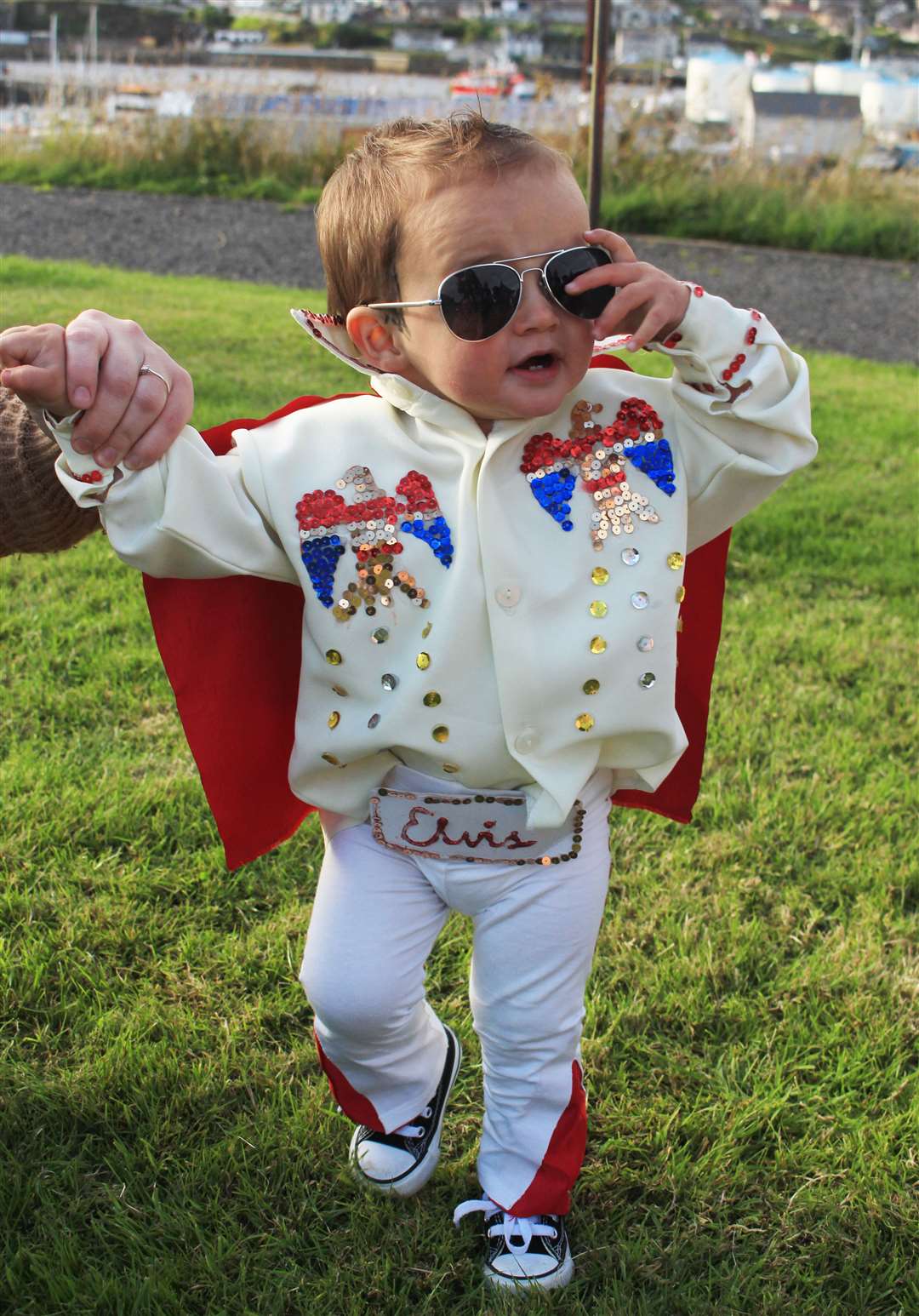 Little Elvis, one-year-old Rayen Amin, was the King of the fancy-dress parade and took first prize for his age group.