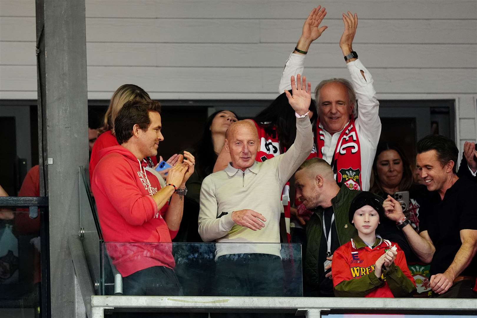 Ryan Reynolds, left, and Mickey Thomas celebrate (Martin Rickett/PA)