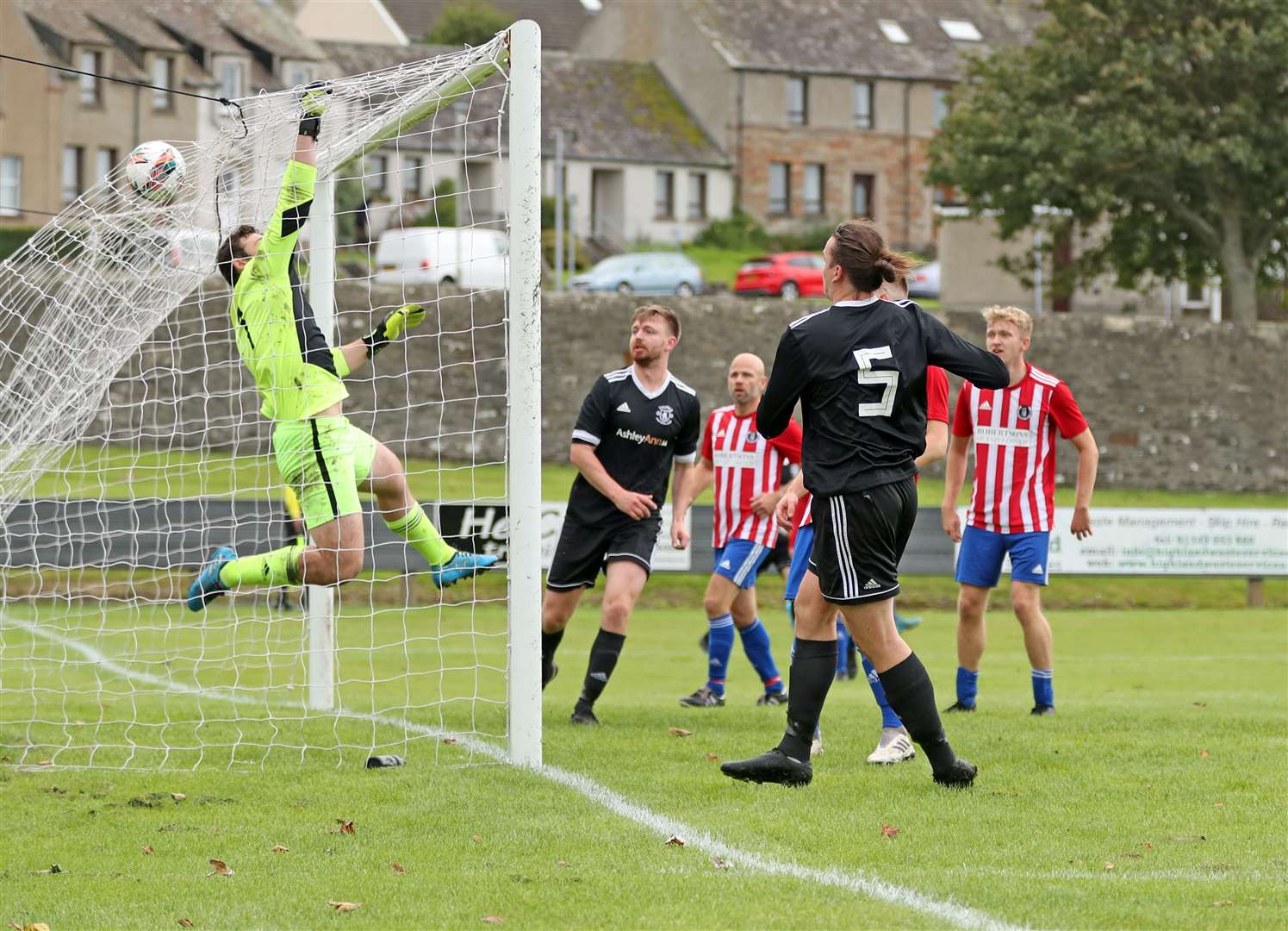 St Duthus goalkeeper William Godding fails to stop James McLean's header from hitting the net. Pic: James Gunn