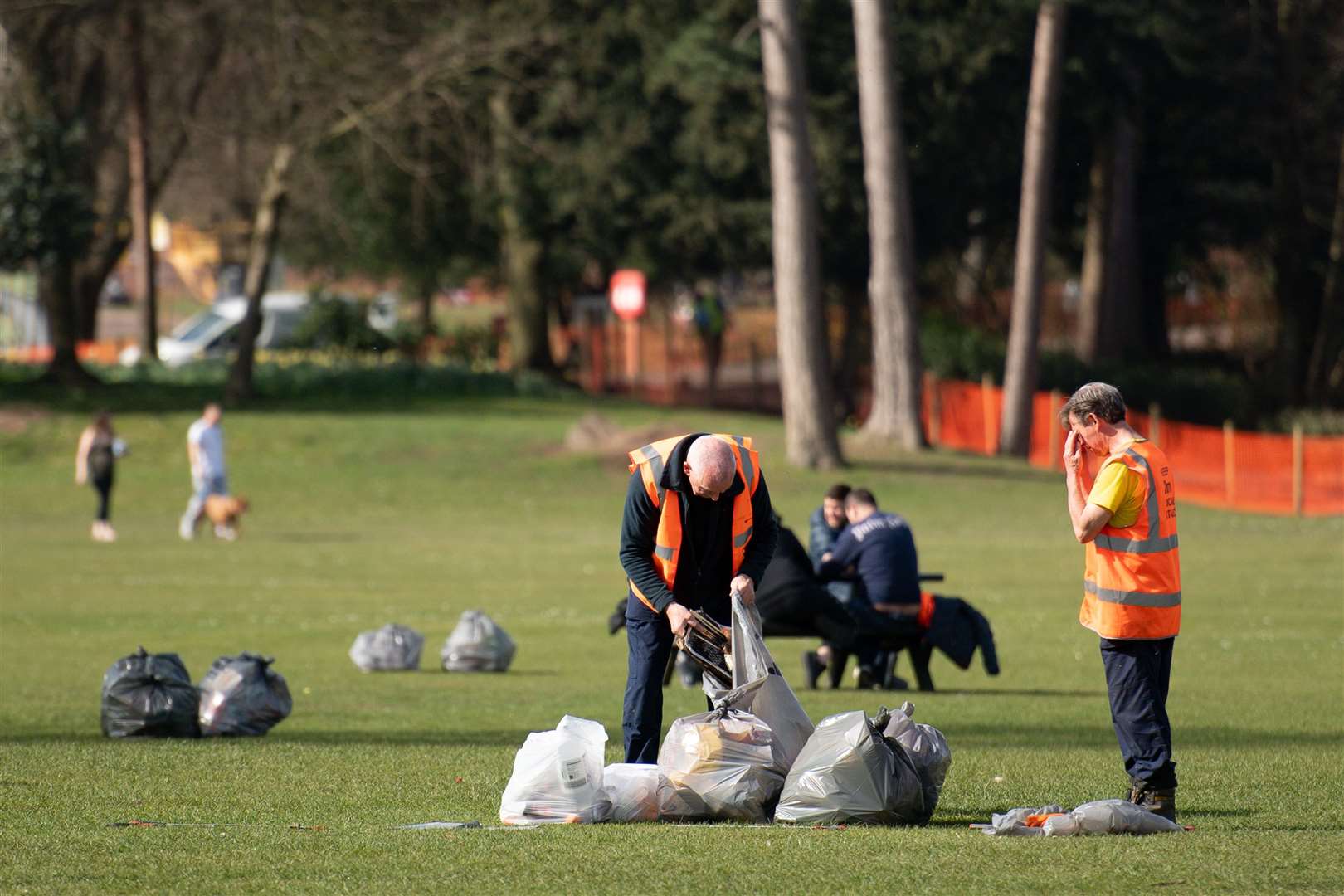 A council worker clears up in Cannon Hill Park, Birmingham (Jacob King/PA)