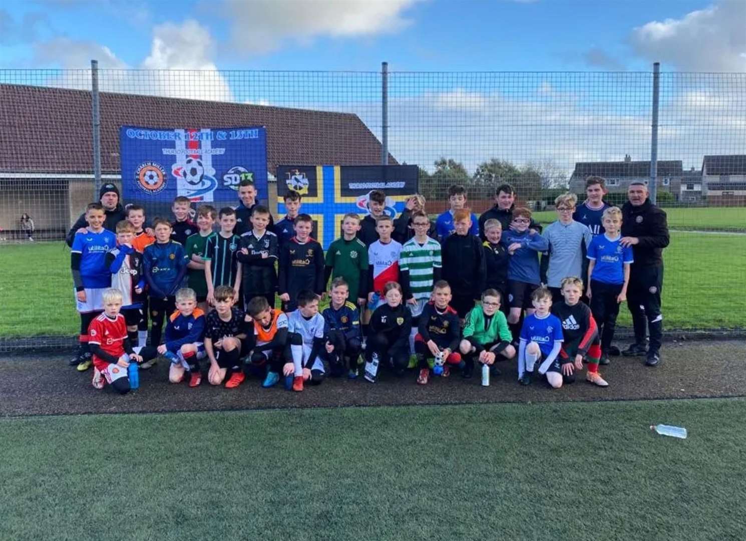The older age group (10-15) at their session with Simon Donnelly and Charlie Miller at the Naver all-weather pitch in Thurso.
