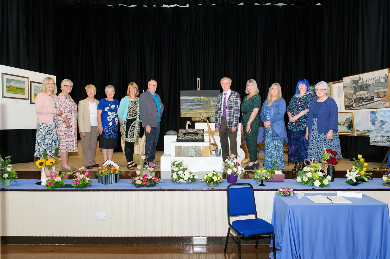 Committee members of the Society of Caithness Artists at last year's exhibition in Thurso High School. Their next show will not be until 2021. Picture: Angus Mackay