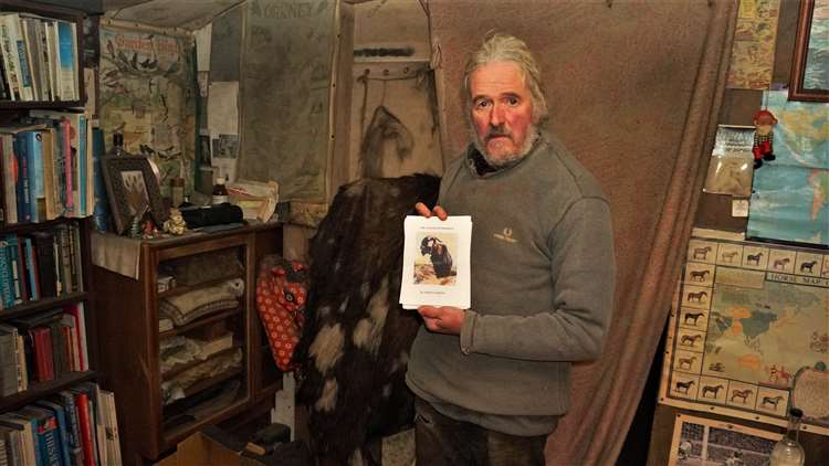 Marcus Moon with the book he recently self-published about his travels with Morbius the goat. Picture: DGS