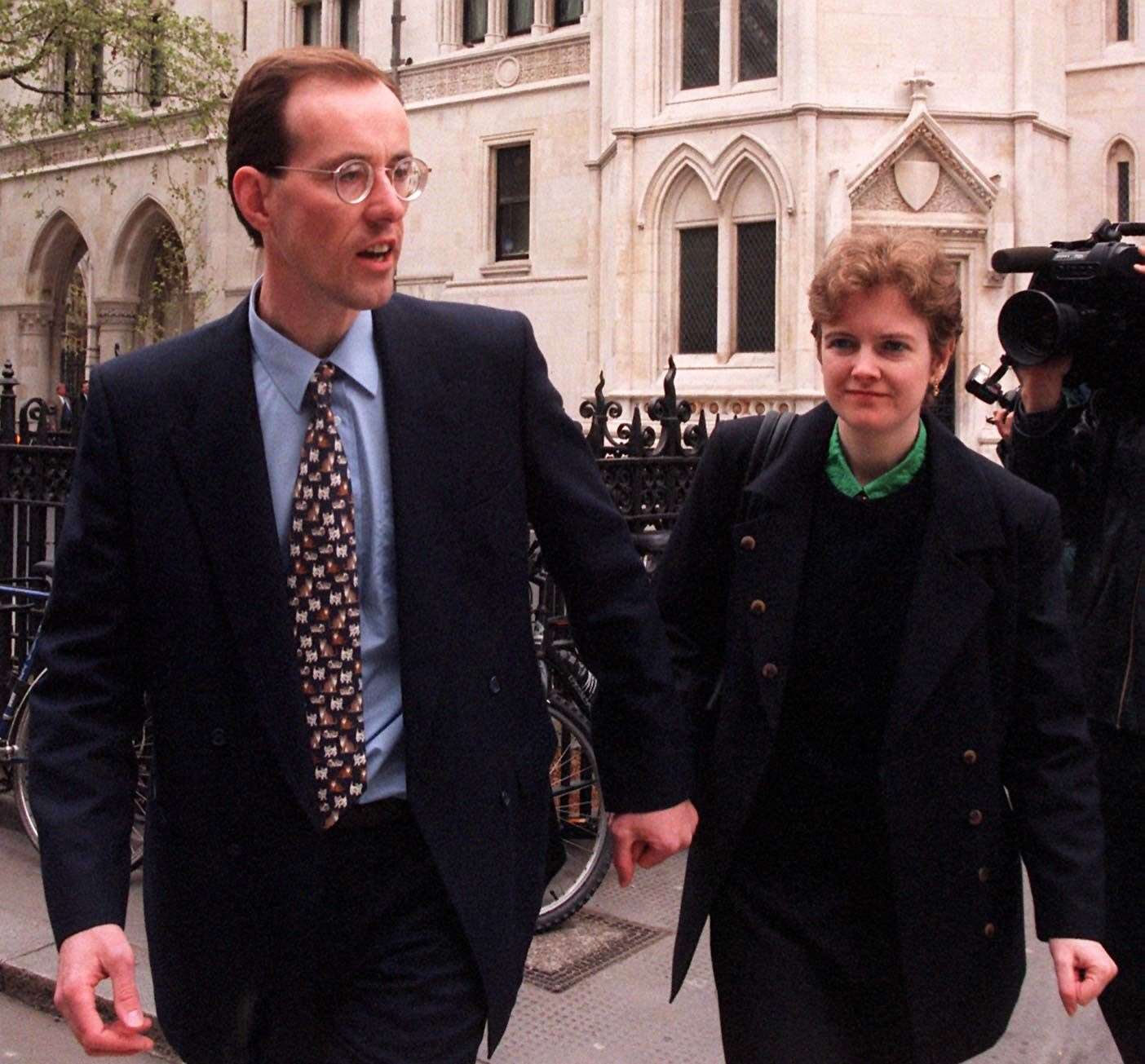 Jonathan Jones and his girlfriend Cheryl Tooze arrive at the High Court in London to hear the appeal court judges, who quashed his conviction for the murder of Ms Tooze’s parents and freed him on April 25 1996, make public their reasons for doing so. Mr Jones reiterated his belief that the police should reopen the case and follow up leads highlighted in the judges’ report (PA)