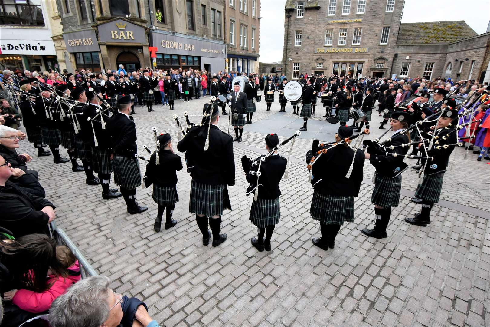 Pipers and drummers forming in Wick's Market Square. Picture: Noel Donaldson