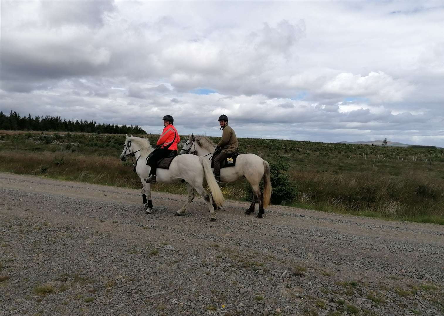 Louis Hall and Irelanda at Loch More, accompanied by Shela-ann Ryan, one of the team from Highland Horse Fun Kingussie.