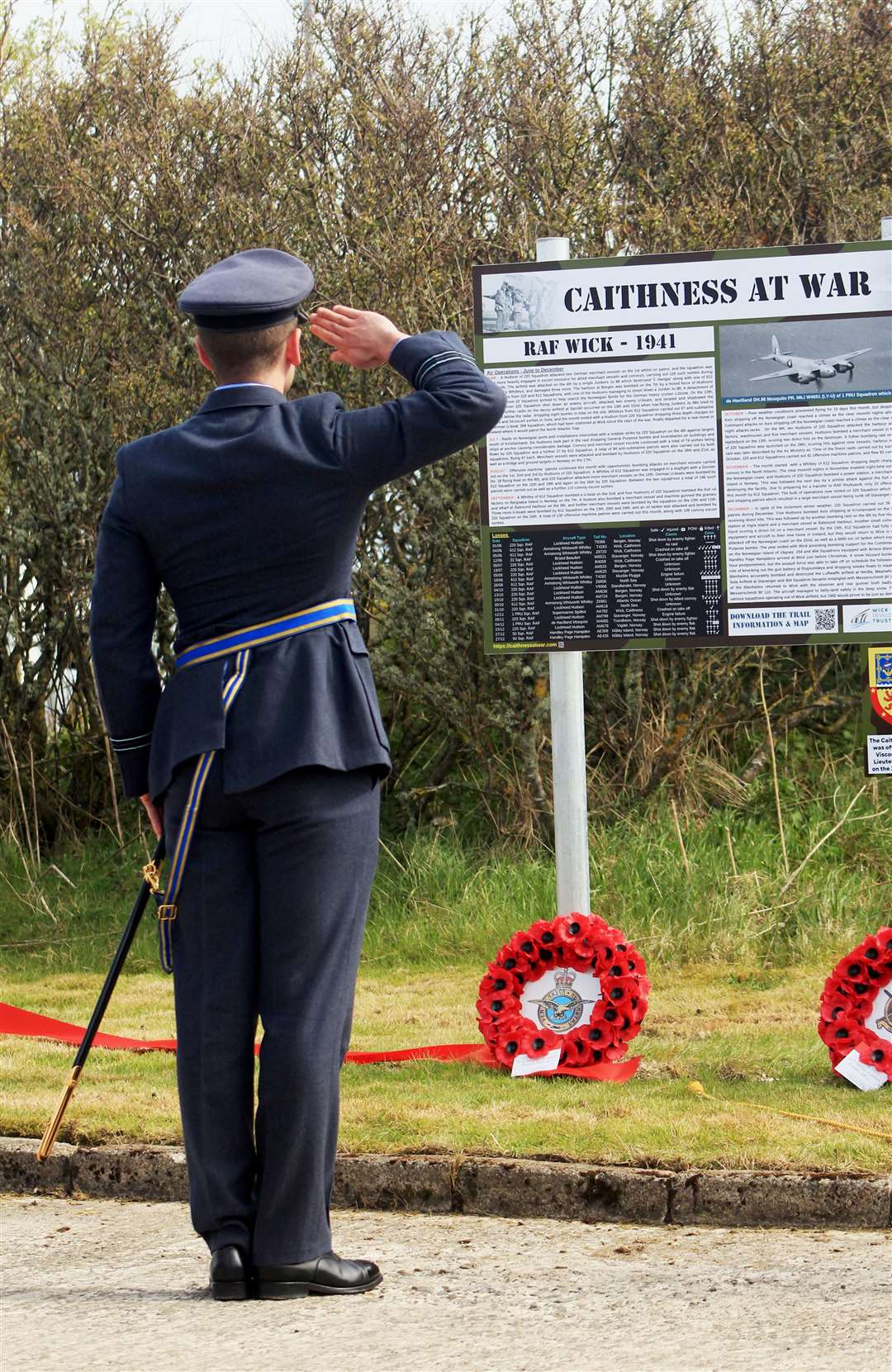 Flight Lieutenant Calum Falconer, of 6 Squadron at RAF Lossiemouth, gives a salute at the official opening of the Caithness At War heritage trail at Wick John O'Groats Airport. Picture: Alan Hendry