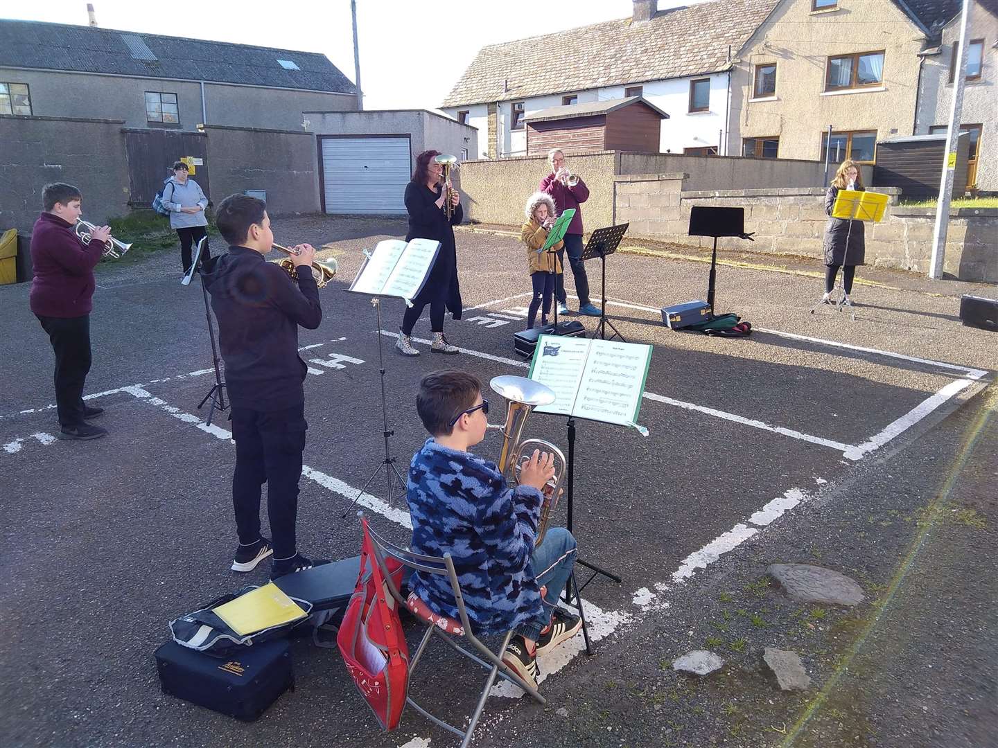 Pentland Brass Band junior members practising in a car park.