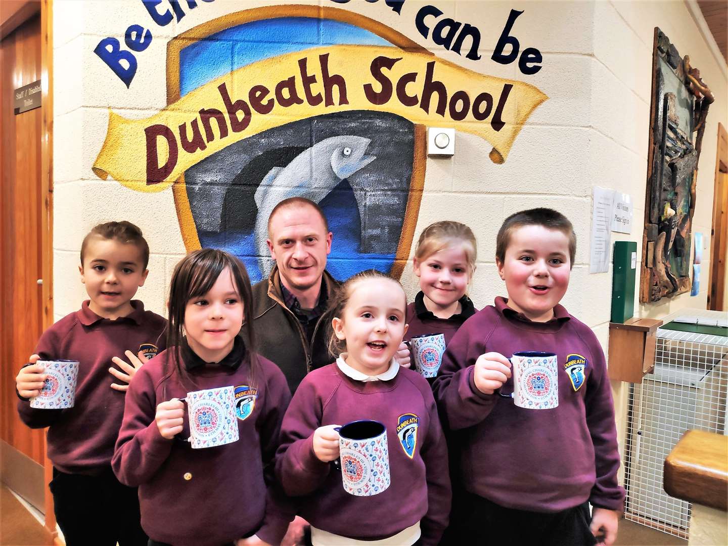 The children were given special Coronation mugs by Daniel Macleod, operation growth manager of Dunbeath and District Centre.