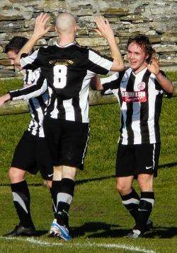 Richard Macadie (right) and Gary Weir celebrate a goal.