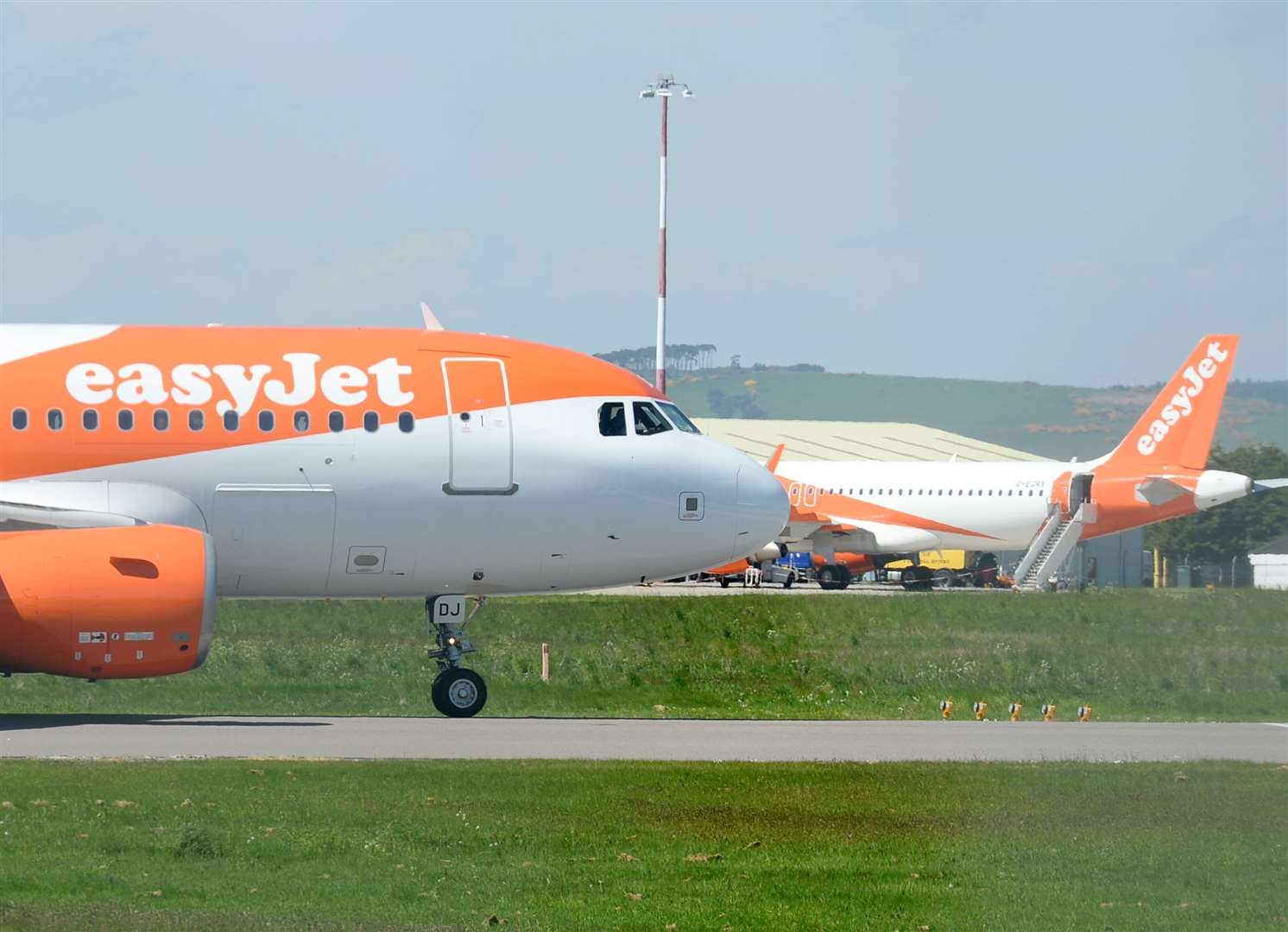EasyJet aircraft at Inverness Airport, where HIAL has its head office. Picture: Gary Anthony