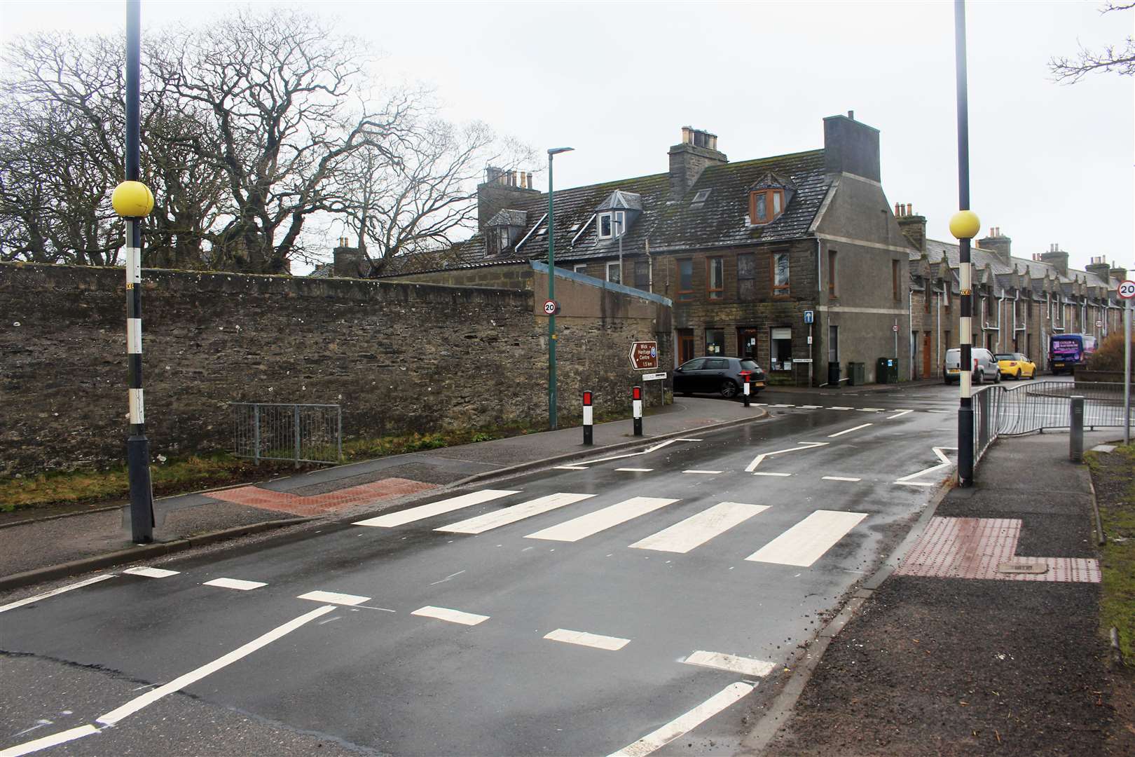 The zebra crossing near the corner of Bankhead Road, with white markings restored.