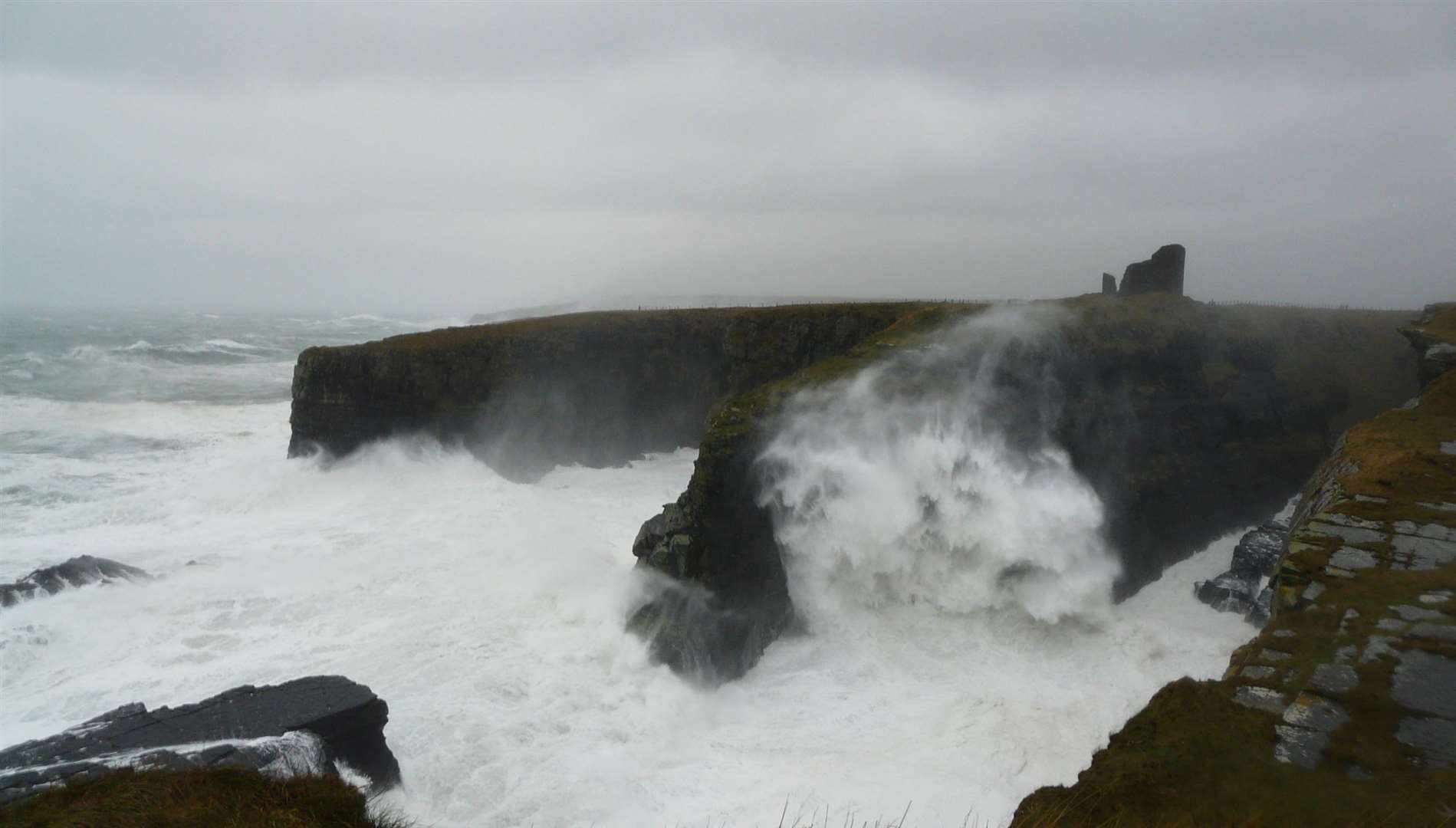 Waves battering the cliffs at the Castle of Old Wick. Historic Environment Scotland says climate change is bringing new challenges for the conservation of historic landmarks. Picture: Alan Hendry