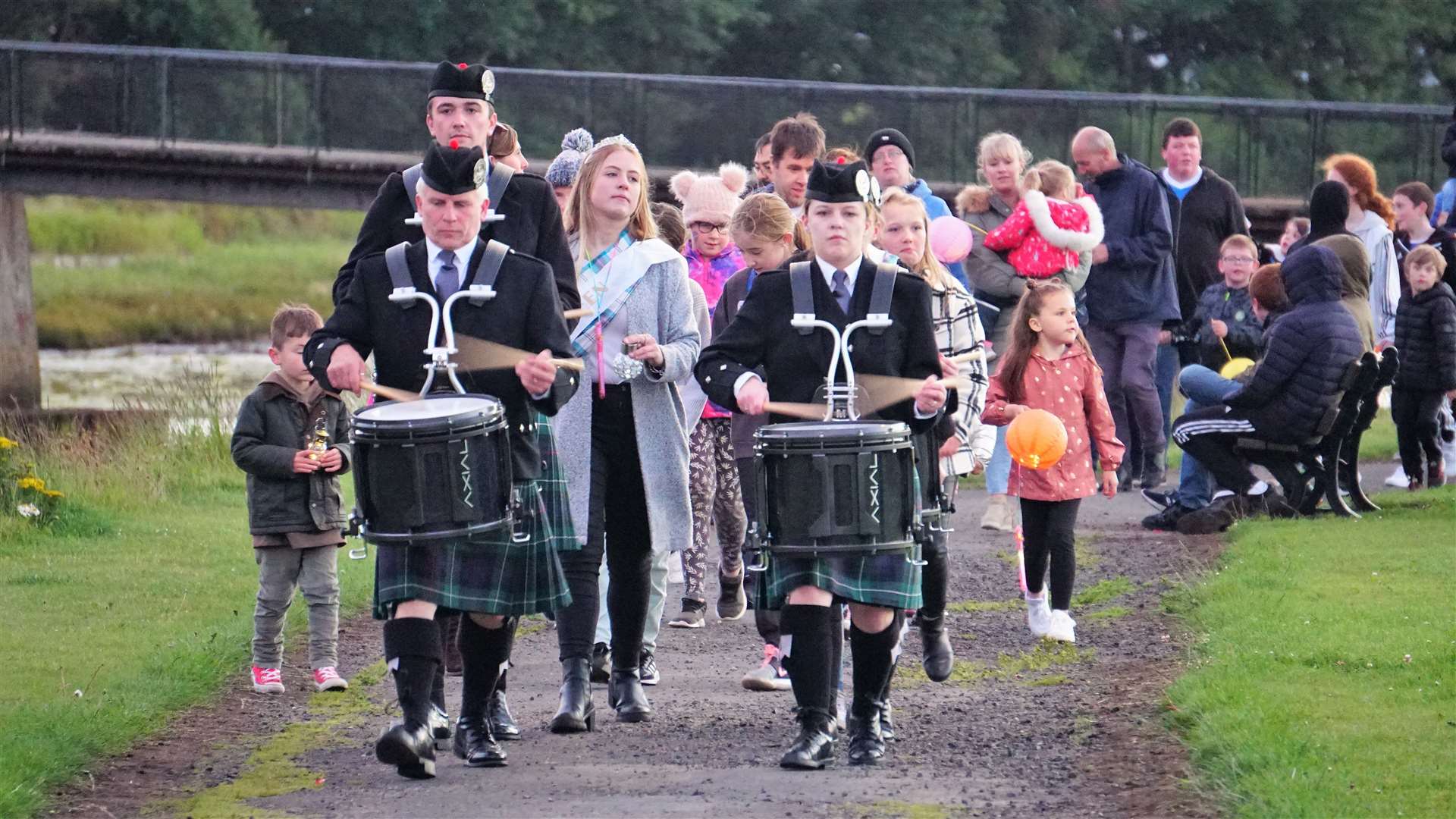 Drummers from Wick RBLS Pipe Band head a group consisting of the Gala Queen and her retinue along with children on a torchlight parade. Picture: DGS