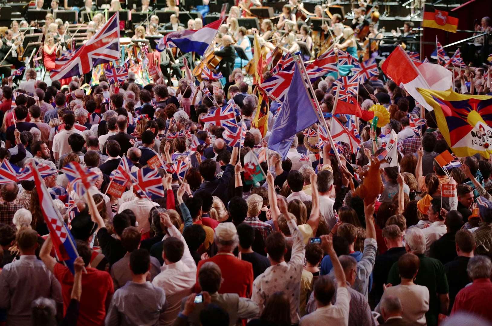 The audience enjoying the BBC Last Night of the Proms, at the Royal Albert Hall (PA)