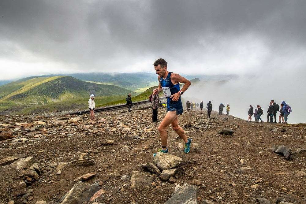 Mountain runner Andrew Douglas on the Snowdon peaks on his way to winning the World Cup Series in 2019. Picture: Marco Gulberti