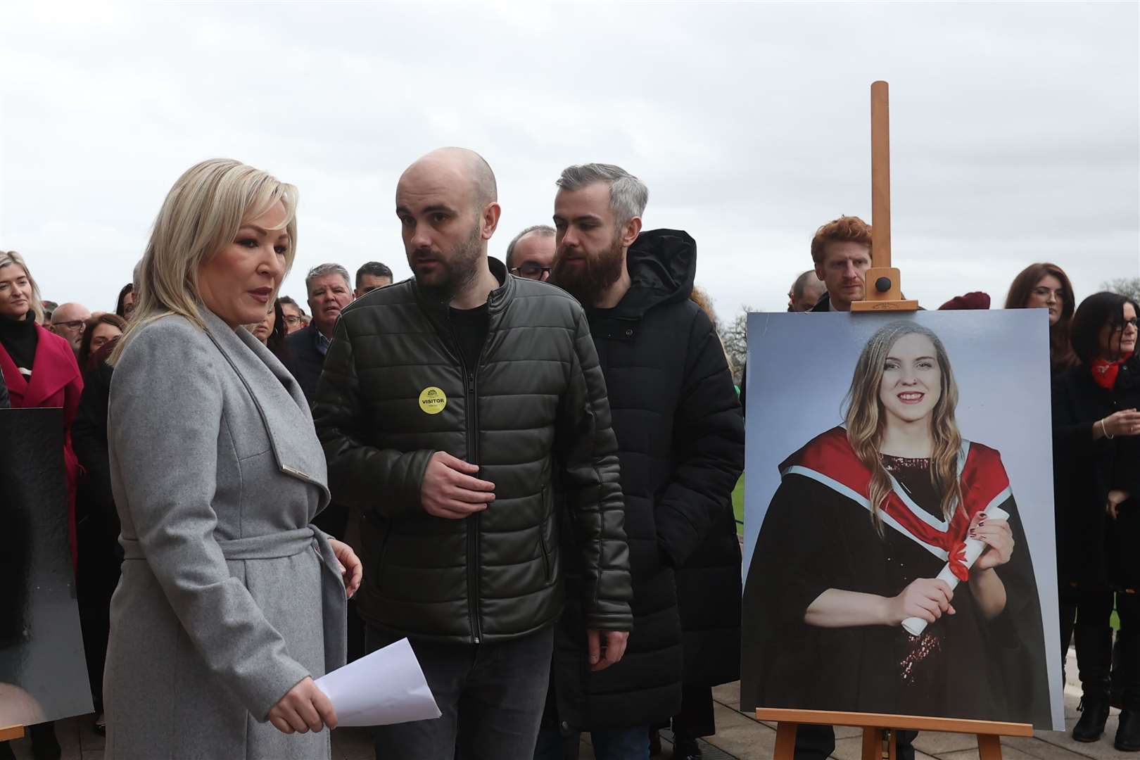 Sinn Fein vice president Michelle O’Neill with Natalie McNally’s brothers Declan and Niall McNally during a vigil (Liam McBurney/PA)
