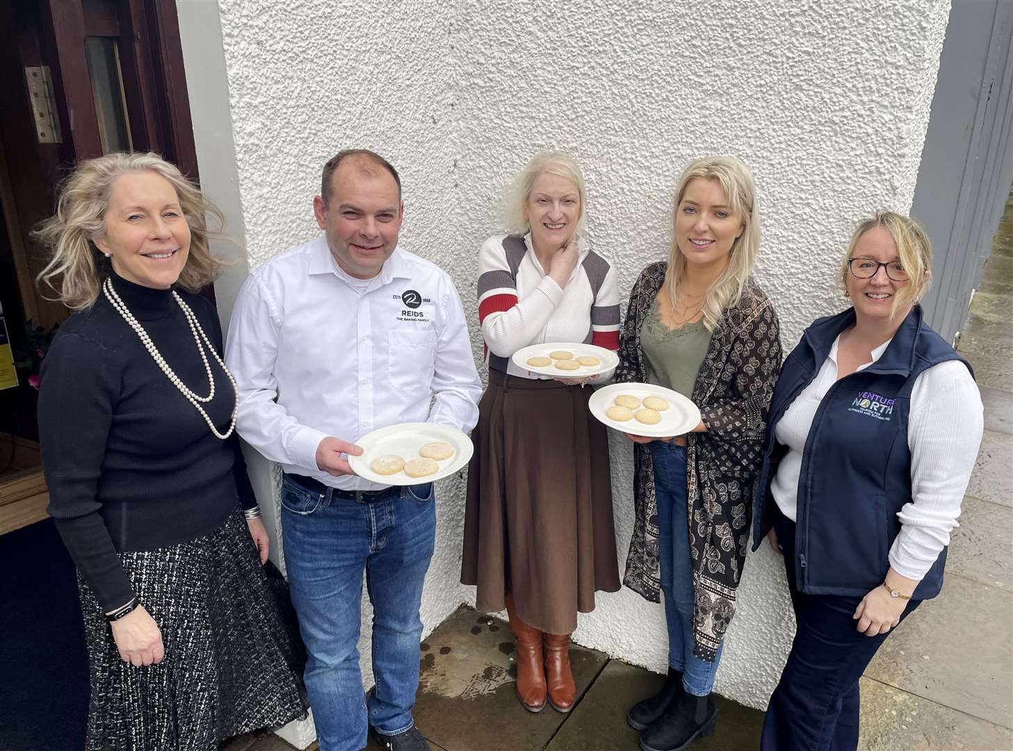 Ellie Lamont (left), owner of Mackays Hotel and chairperson of Venture North, and Cathy Earnshaw (right), Venture North destination strategy manager, with Shortbread Showdown judges Gary Reid, June McIvor and Catriona Corbett outside Mackays Hotel.