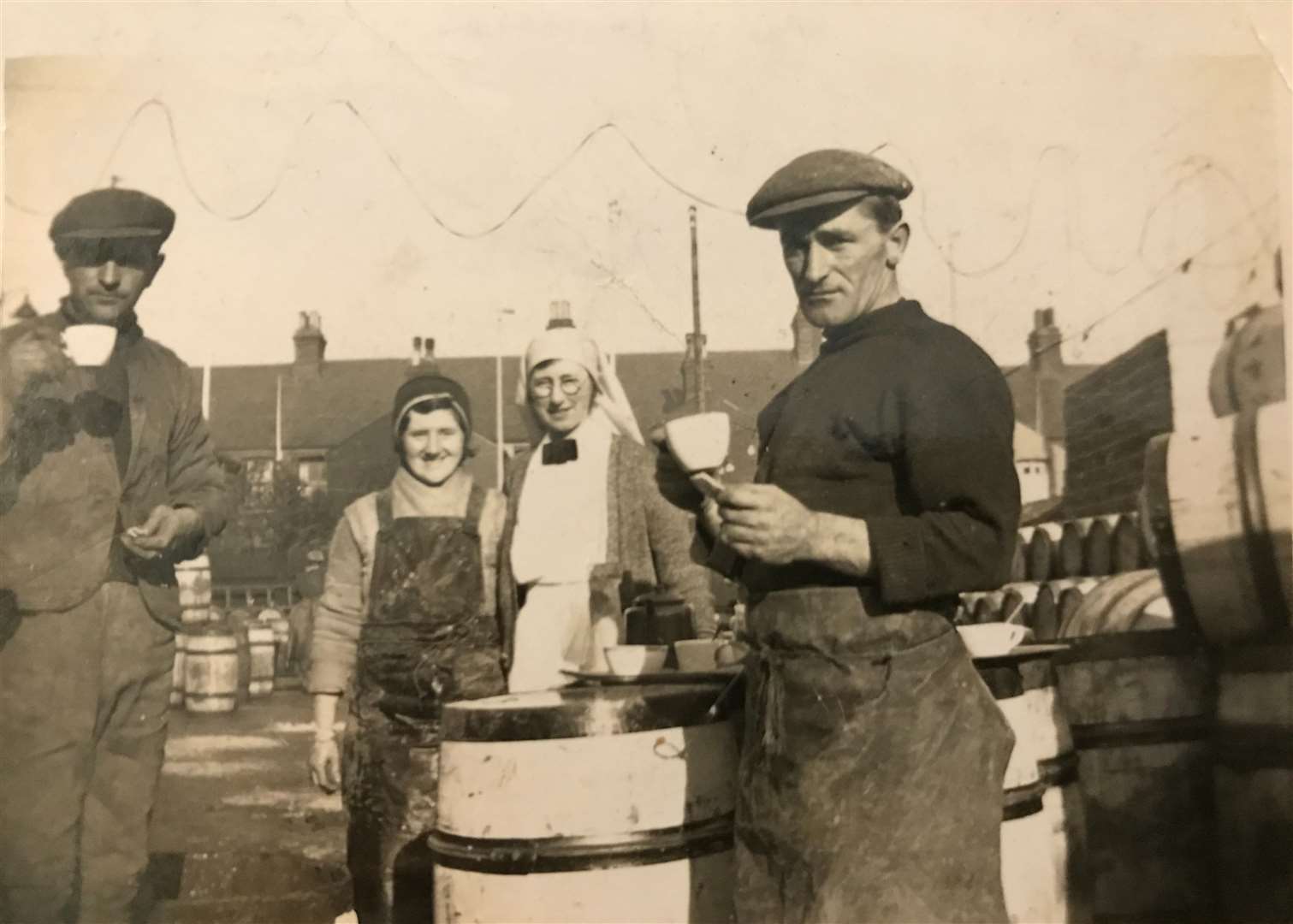 Wick woman Barbara Harper submitted a photograph which shows her mother and father, Peg Gunn and Robert Sutherland taking a quick tea break. Her mother was a herring packer, while her father was a cooper.