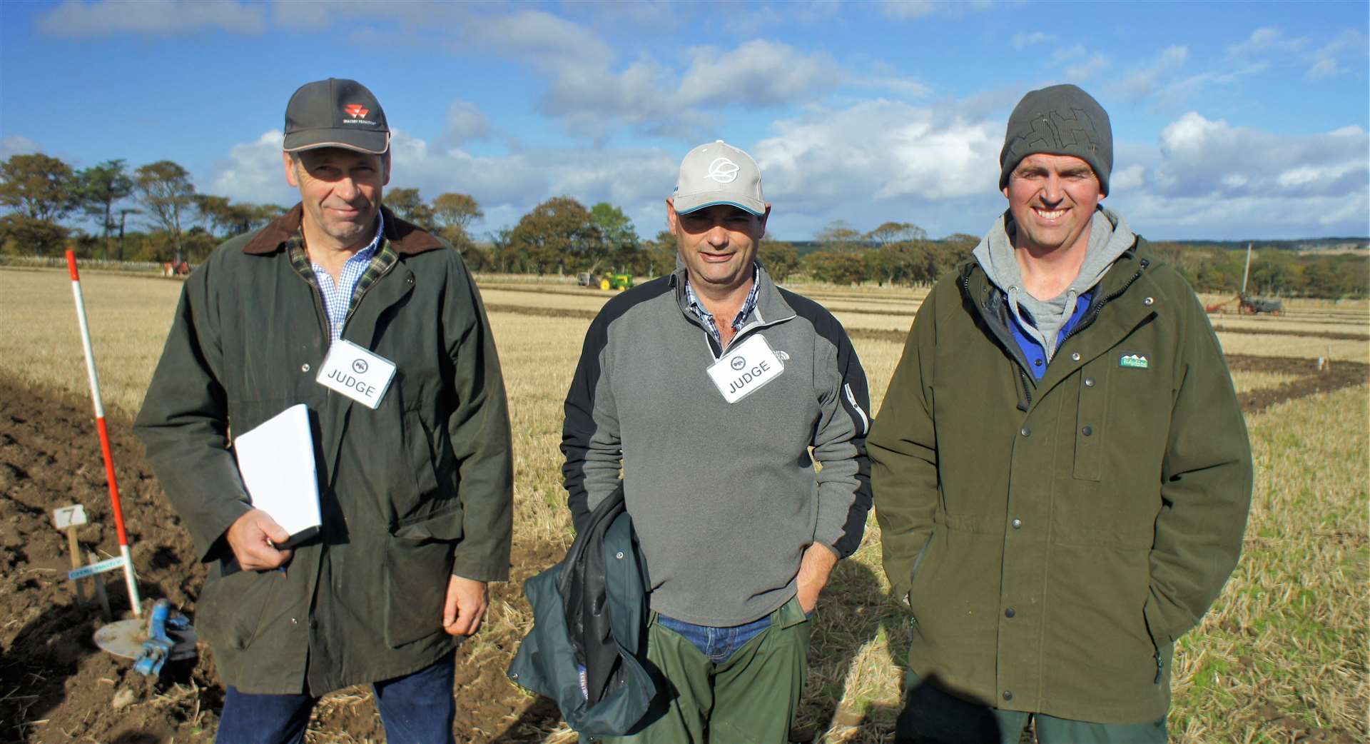 Judges at the event were, from left, Andrew Gammie, Iain Macrae and Robert Sutherland. Robert hosted the event at his farm at Achunabust last year. Picture: DGS